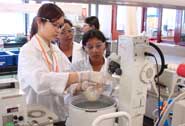 Singaporean school students experiment during one of the chemistry outreach workshops at the National University of Singapore