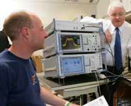 Professor Joe McGeehan (right) with a member of staff in the CCR