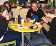 Teenagers sitting in the new Oakfield Grove cafe in Oakfield House