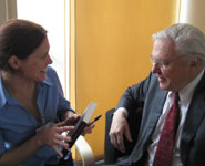 Sir David Attenborough talking to a guest at the opening of the new Animal Welfare and Behaviour building.