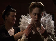 An actor being dressed for The Chamber of Demonstrations DVD
