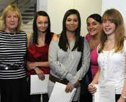 Apprentices receive their awards. Also pictured are the Registrar, Derek Pretty (top right) and Barbara Wilyman from Brunel and Gordano Training (bottom left)
