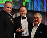 Jerry Woods (centre) receives his award from host Ronnie Corbett and (left) Brian Sims, editor of Security Management Today online, sponsor of the award