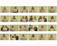 Still from the end of the film, showing Filton students holding banners with the BRACE logo
