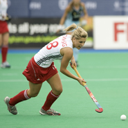 Georgie Twigg competing in a women's hockey match