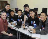 Dr Adam Crewe with Team of Legend