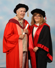 Phoebe Caldwell receives her honorary degree from Professor Kelley Johnson, Professor of Disability Policy & Practice
