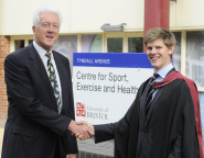 Gordon Trevett, Sports Performance Manager, congratulates Lawrence Clarke