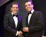 Stephen Thompson receiving his award from Andy Butler, Development Director for Explore Investments (a division of Laing O’Rourke)