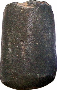 An adze - a type of tool used used for smoothing or carving wood