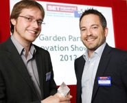 Luke Marsden (left) receiving his award from Nathan Guest of Veale Wasbrough Vizards