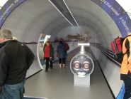 Visitors enjoying the model of the LHC tunnel