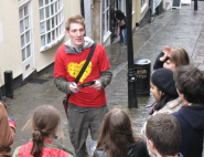 James with a tour group on Christmas Steps