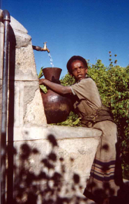 A villager uses the new tap