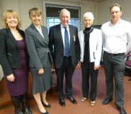 Geoff Davis, centre, with daughters Tonicha and Angela, wife Sue and son Paul