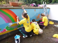 During: students work on the mural