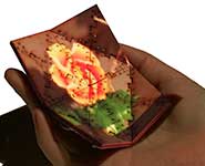 A high-fidelity prototype using projection and tracking on wood tiles that are actuated with thin shape-memory alloy wires