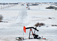 Equipment for monitoring seismic activity being deployed in a borehole at the Weyburn CO2 storage site in Saskatchewan, Canada