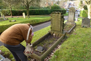 Pilot volunteer Mr John Sneddon records the grave of Corporal Herbert St Clair Marlatt of the Canadian Engineers 