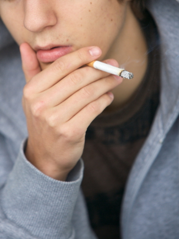 Young boy smoking