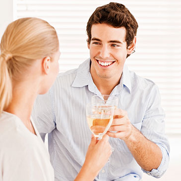 Image of a man and woman drinking wine