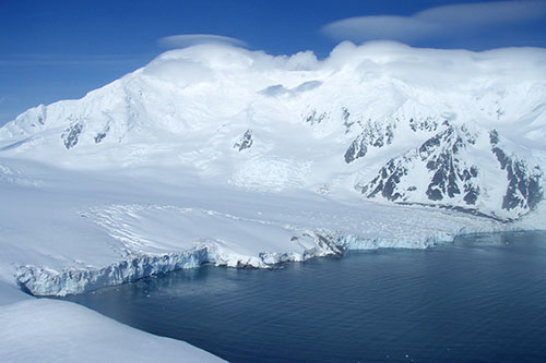 Image of a glacier system on Livingstone Island located near the Antarctic Peninsula, discharging ice into the ocean (photo Alba Martin-Español).