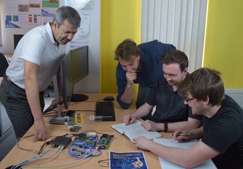 Dr Naim Dahnoun running an experiment with his students