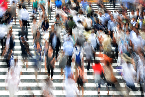 People crossing a zebra crossing