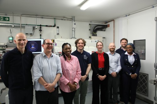 Image shows members of the Diamond Battery team with Plasma Deposition Rig at UKAEA