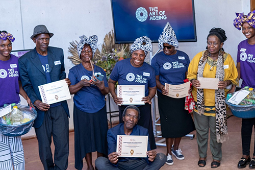Music and dance category winners, The Hopley Group, pose with 1st place prizes and certificates in Harare, Zimbabwe
