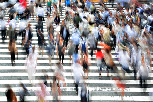 Pedestrians walking across a crossing