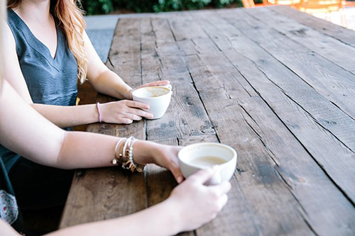 Two women sat at a table