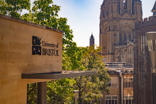 Wills Memorial Building with University logo in foreground