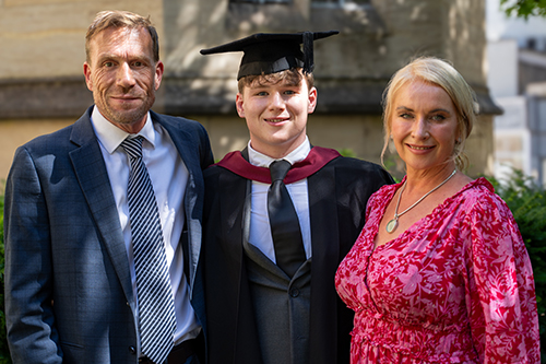 Archie Wills-Johnson with his parents, Paul Johnson and Karen Wills