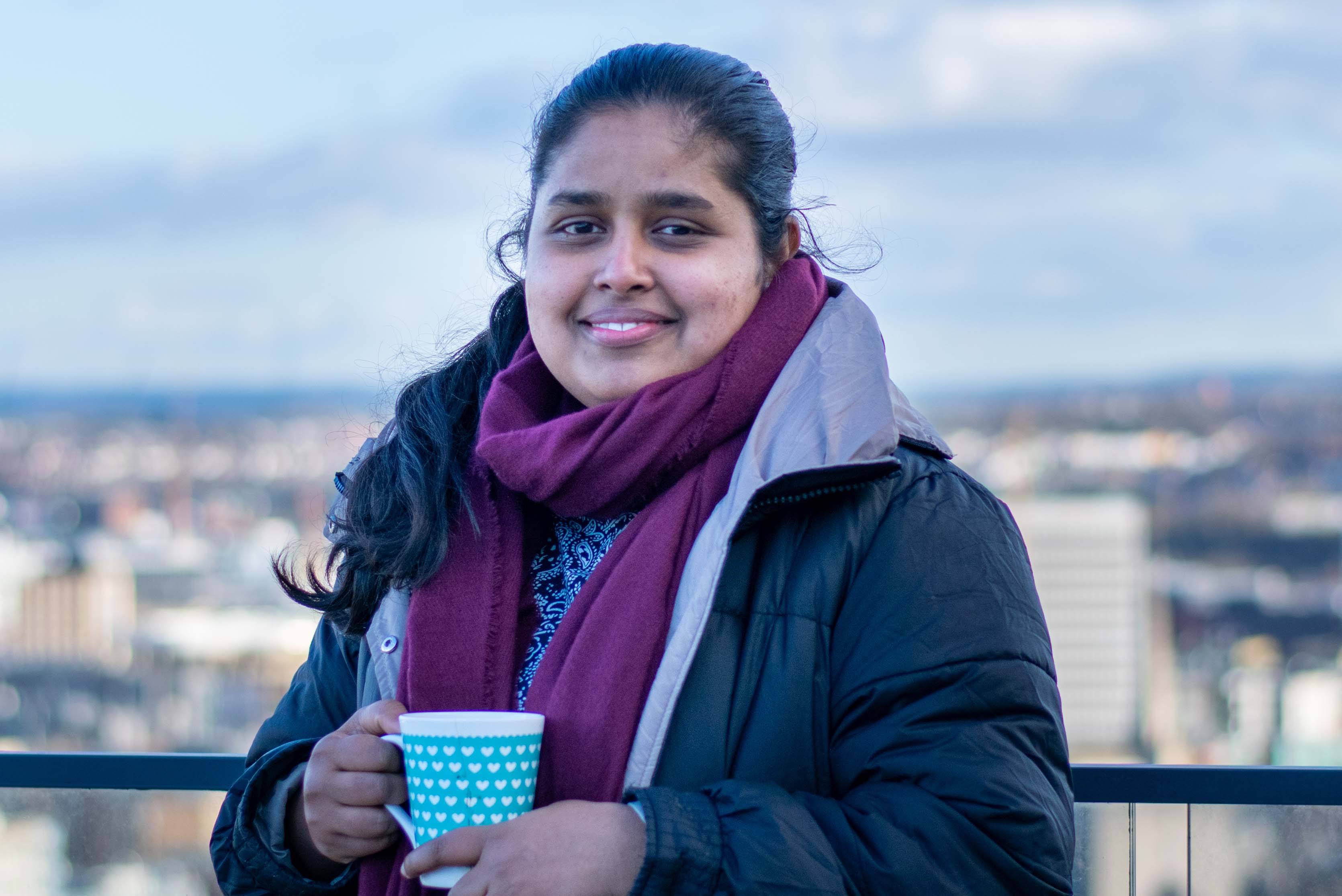 Thamali Kariyawasam in Bristol holding a cup of tea