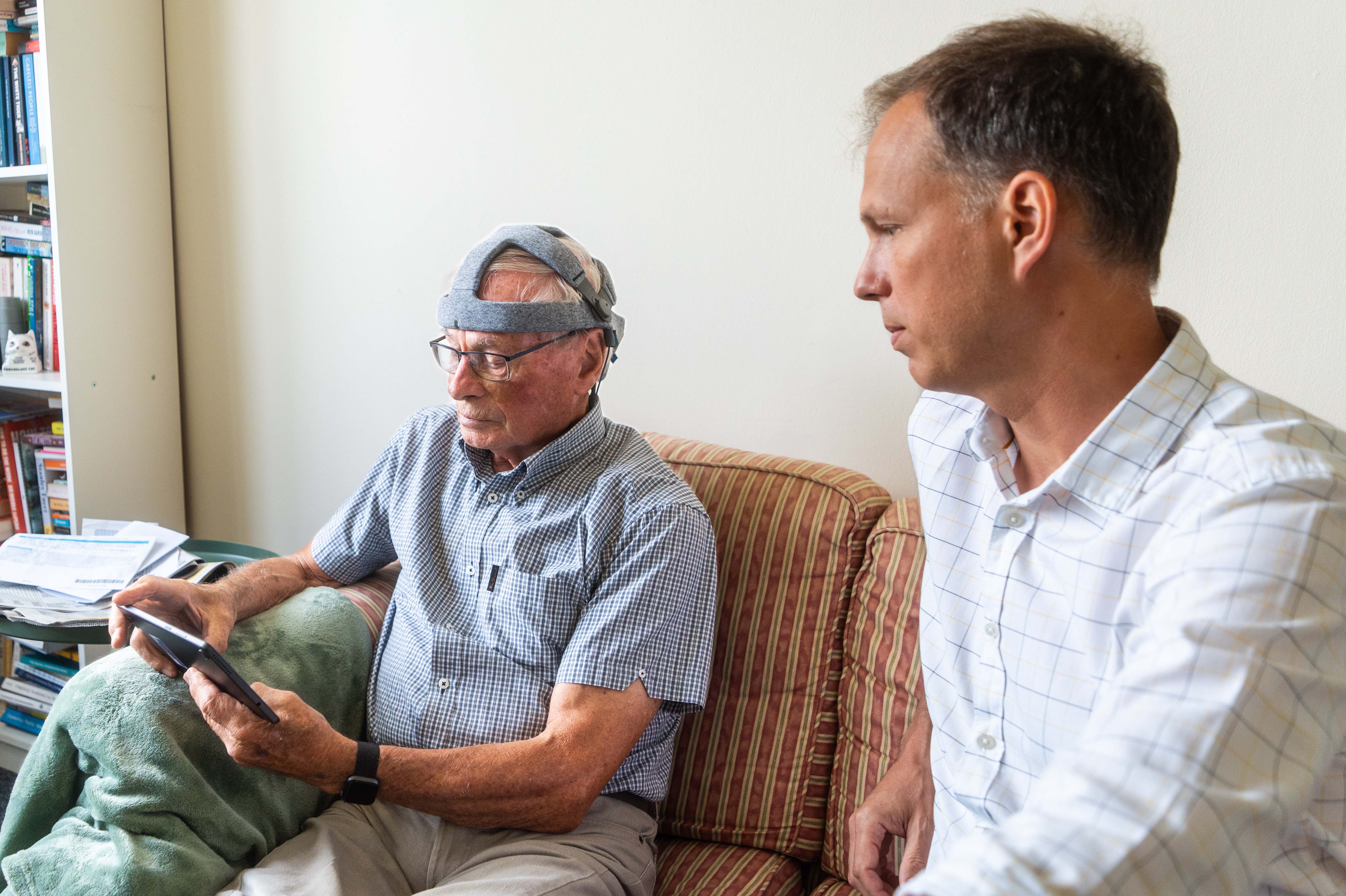 John Stennard, a healthy volunteer, taking the Fastball test in his home, with Dr George Stohart