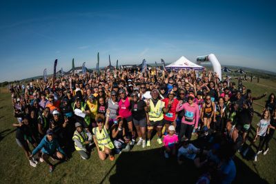 Group photo of participants having completed a Black to the Trails event