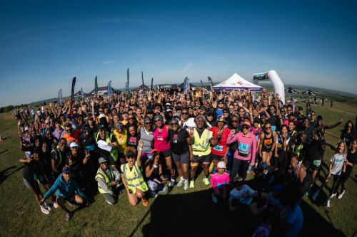 Group photo of participants having completed a Black to the Trails event