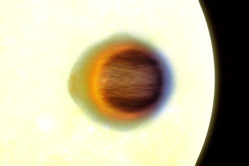 Ilustração de WASP-17 b transitando diante de sua estrela, com diferentes extensões atmosféricas.
