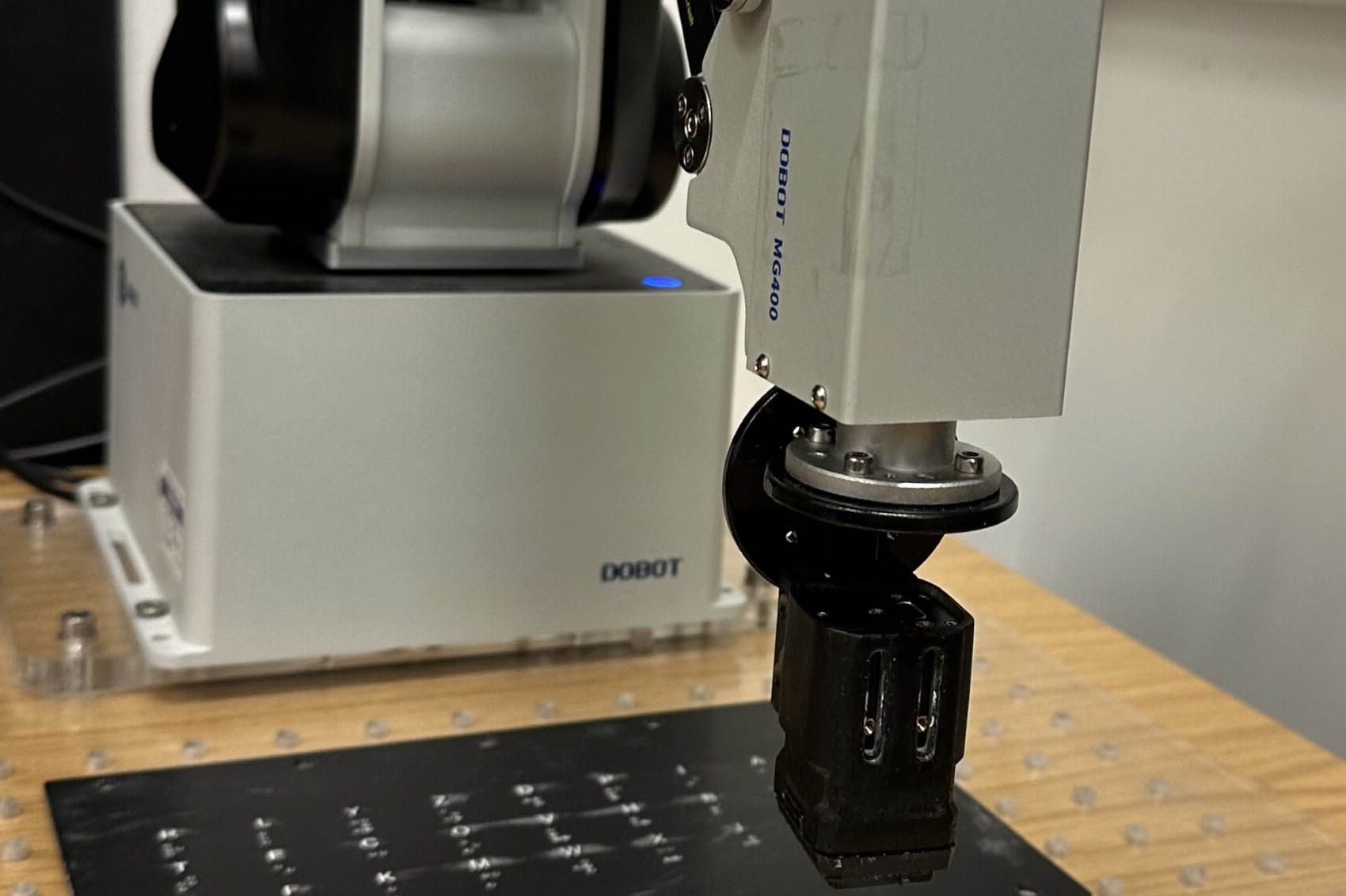 A robot-mounted tactile sensor collecting Braille data