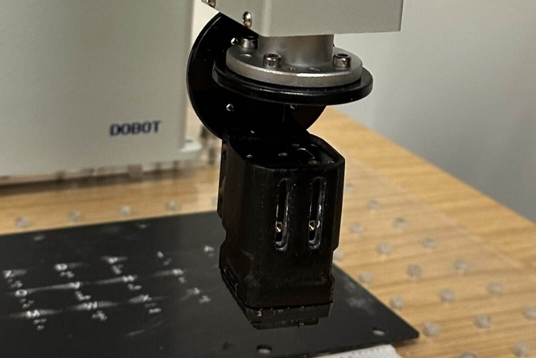 A robot-mounted tactile sensor collecting Braille data