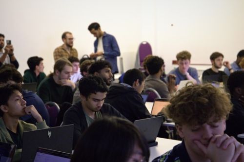 students sitting in a computer chip design workshop