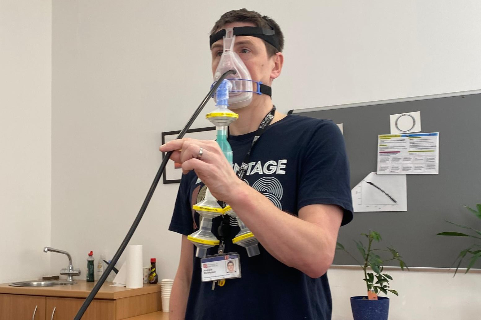A person demonstrating the PLUME device