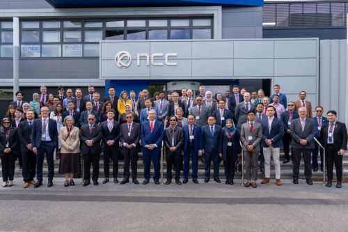 Group photo at the NCC Innovation for Industry (Bristol and Bath Science Park), featuring senior representatives from UK Government, academia, and leading industry players, reinforcing the UK’s position as a global hub for advanced technologies and international collaboration.