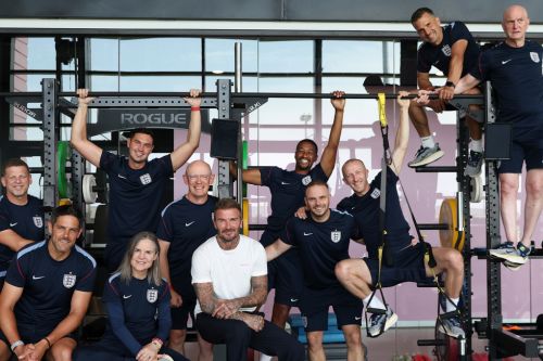 Sir David Beckham photographed with members of the England backroom staff
