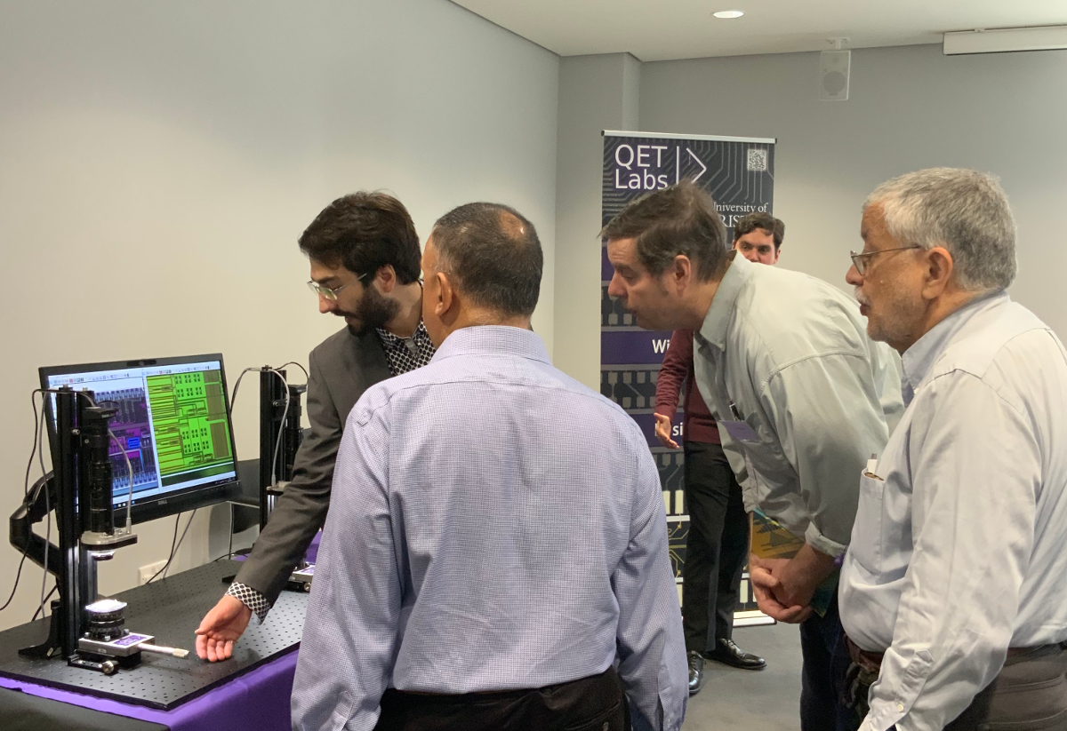 Joshua Silverstone explaining demo using photonic chips