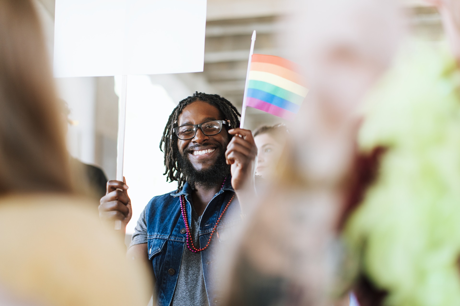 Activist waving a rainbow flag