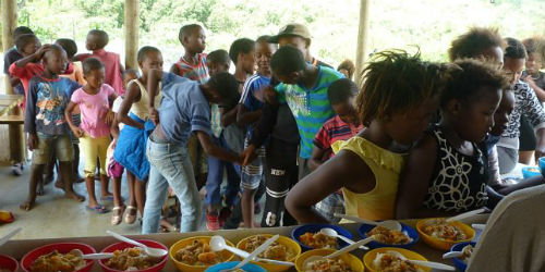 queuing for bowls of food