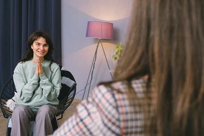 Young woman with therapist