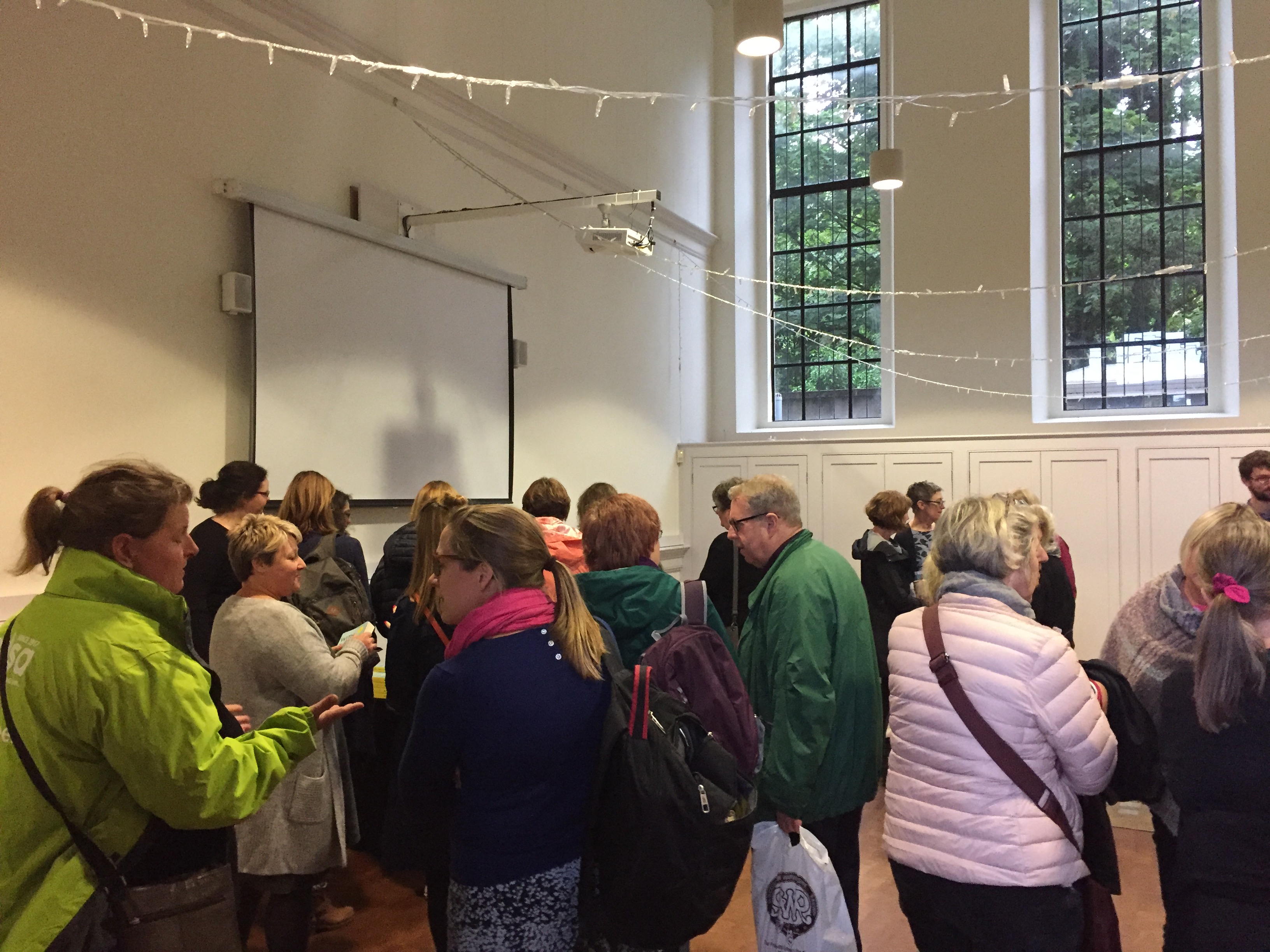 People mingling at Kathryn Mannix event